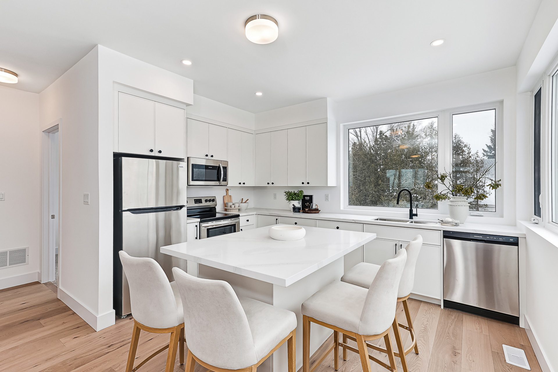 Kitchen with island and Frigidaire appliances