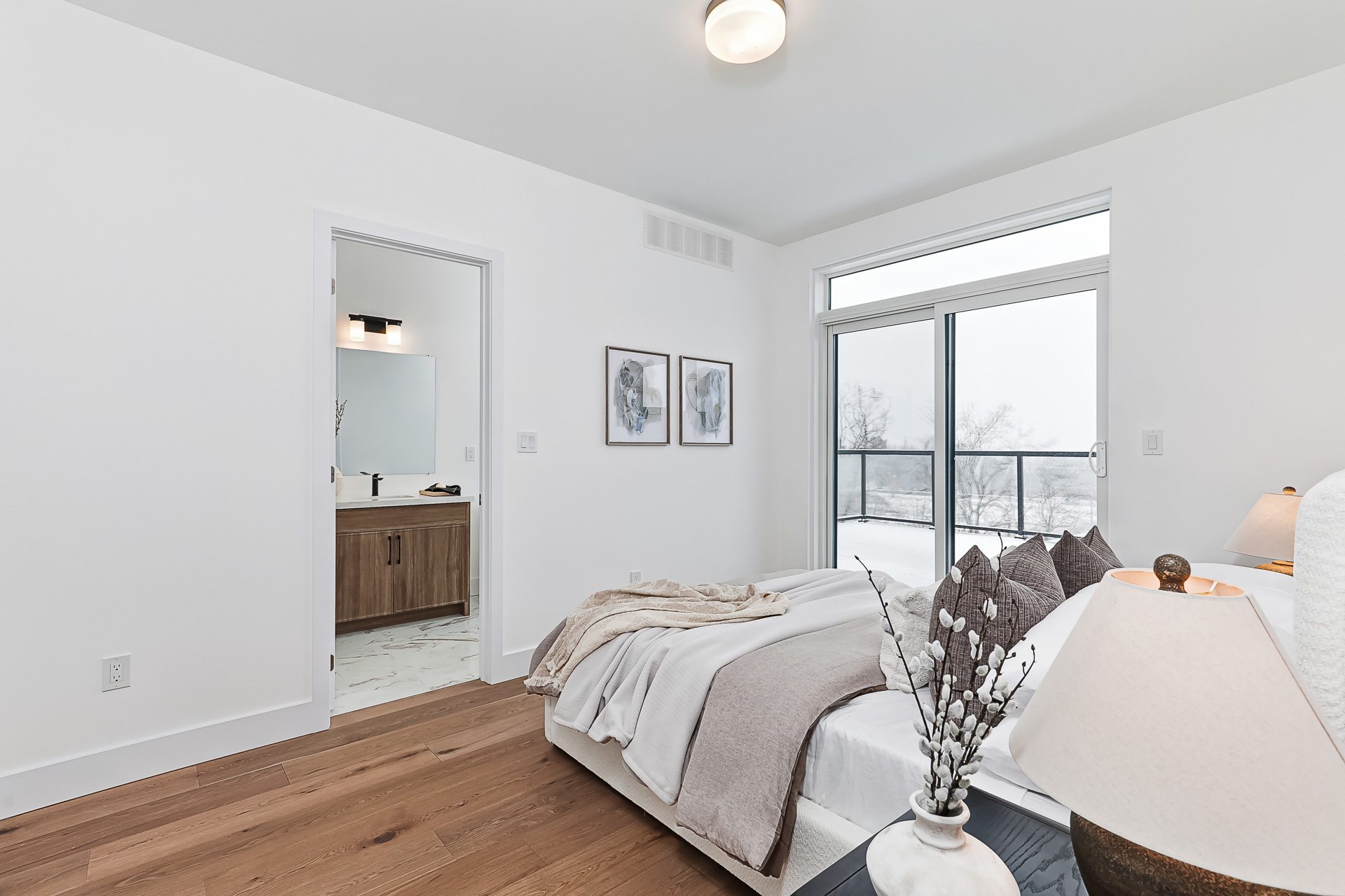 Primary bedroom with balcony access